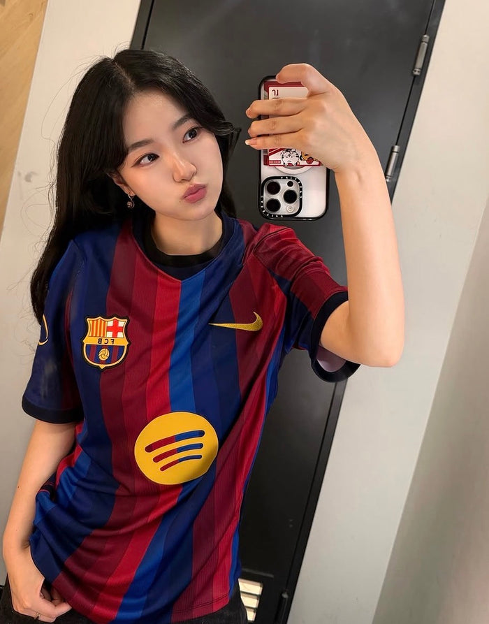 Customer wearing Barcelona jersey